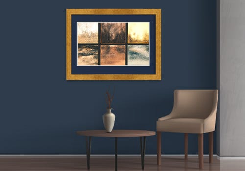 A navy matboard with a gold frame on a navy wall A navy matboard with a gold frame on a navy wall