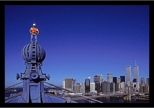 Self-Portrait of Dave Frieder standing on the Northern most sphere of the Brooklyn Tower Self-Portrait of Dave Frieder standing on the Northern most sphere of the Brooklyn Tower