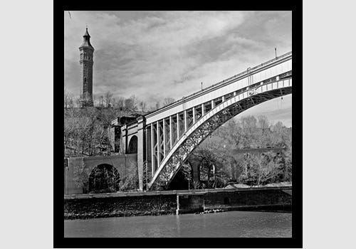 Aqueduct Bridge Steel arch, water tower and clouds taken from Bronx side 1995 Aqueduct Bridge Steel arch, water tower and clouds taken from Bronx side 1995