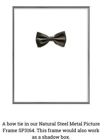 "A bow tie in our Natural Steel Metal Picture Frame SP3164. This frame would also work as a shadow box."
