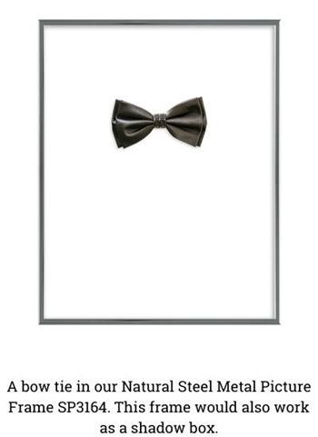 "A bow tie in our Natural Steel Metal Picture Frame SP3164. This frame would also work as a shadow box." "A bow tie in our Natural Steel Metal Picture Frame SP3164. This frame would also work as a shadow box."