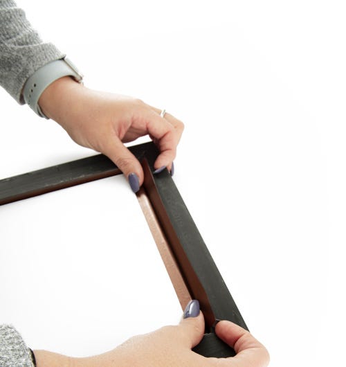 Lineco Frame Sealing Tape being applied to a wood frame rabbet to protect the artwork Lineco Frame Sealing Tape being applied to a wood frame rabbet to protect the artwork