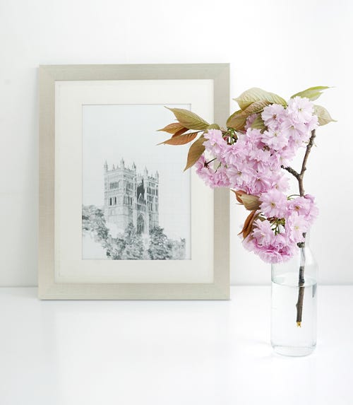 The Linen Silver Metal Frame NL550 around an art print of a building The Linen Silver Metal Frame NL550 around an art print of a building