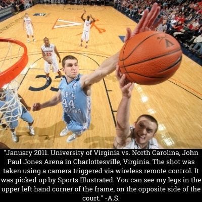 A photo of a blocked shot at a University of Virginia vs. North Carolina basketball game  