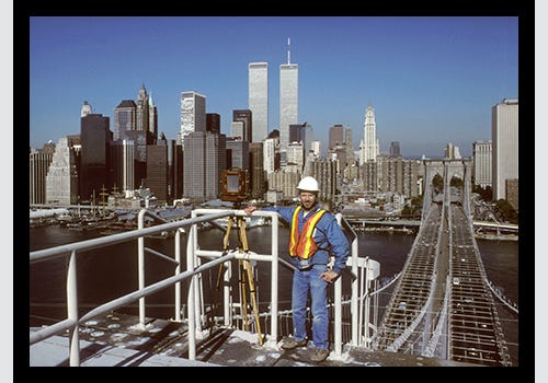 Dave Frieder standing on the Brooklyn Tower of the Brooklyn Bridge Dave Frieder standing on the Brooklyn Tower of the Brooklyn Bridge