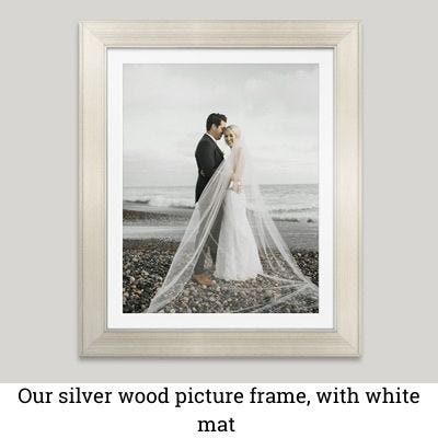 "Our silver wood picture frame, with white mat" "Our silver wood picture frame, with white mat"