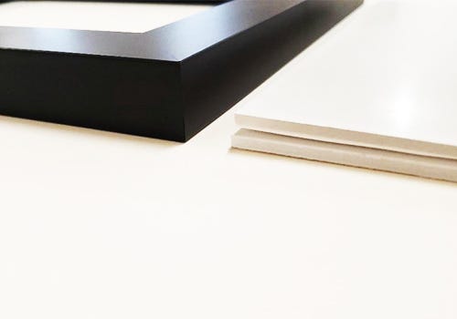 Mounting board next to a frame Mounting board next to a frame