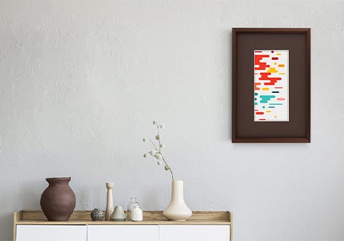 A frame with a brown mat in use in a room A frame with a brown mat in use in a room