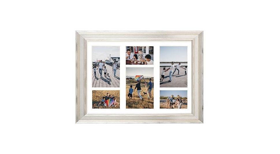 Family photographs in a multi-cut collage mat and rustic wood frame.