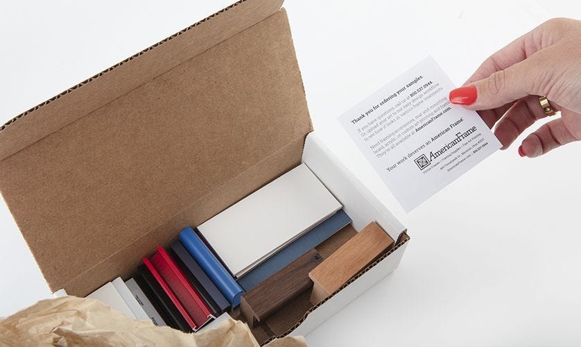 A sample box full of frames and mat boards.