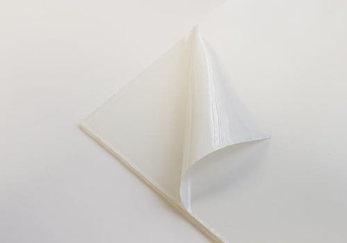 A partially peeled piece of arcylic A partially peeled piece of arcylic
