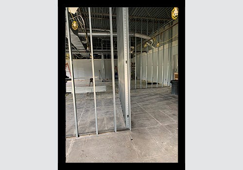 During construction of American Frame remodeling their showroom and offices. During construction of American Frame remodeling their showroom and offices.