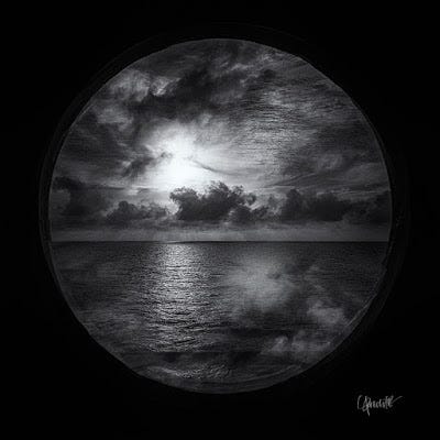 A black and white photograph of a lake with a black border cutout in the shape of a circle A black and white photograph of a lake with a black border cutout in the shape of a circle