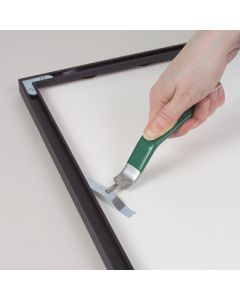 Easily insert and remove spring clips from metal frames by twisting the clip in the Fletcher Springmate's slotted nose.