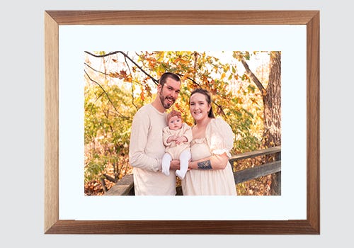 Framed family photographs make a great gift for new parents or grand parents Framed family photographs make a great gift for new parents or grand parents