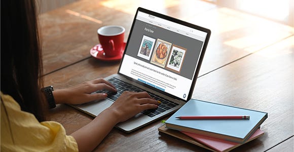 Laptop with AmericanFrame.com design preview tool