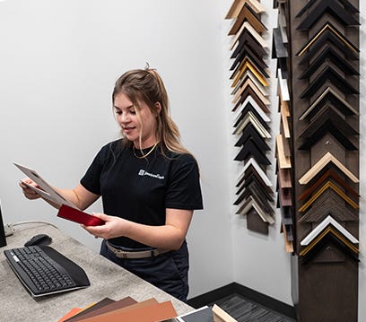 Your design assistant can hold up samples of mat boards and frames for you to see Your design assistant can hold up samples of mat boards and frames for you to see