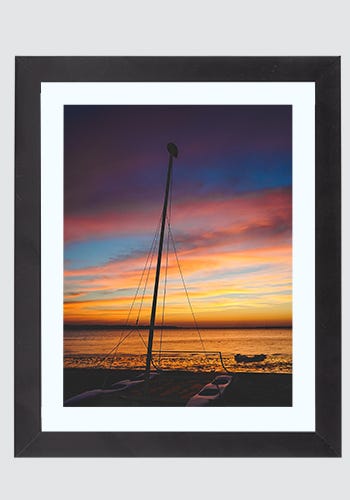 Frame a photograph from a recent vacation to cherish the memories. Frame a photograph from a recent vacation to cherish the memories.