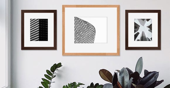 Mix and match frame styles for a unique gallery display Mix and match frame styles for a unique gallery display