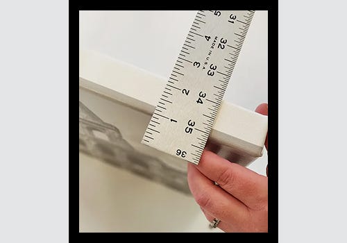 Measure the stretched canvas thickness to order the right floater frame