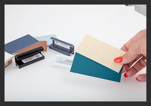 Comparing mat board and frame samples together. Comparing mat board and frame samples together.